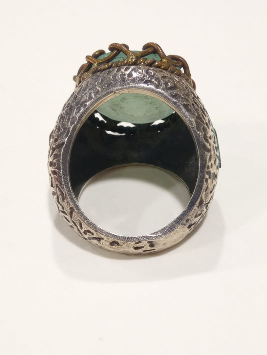 Anello a fascione in argento con acquamarina