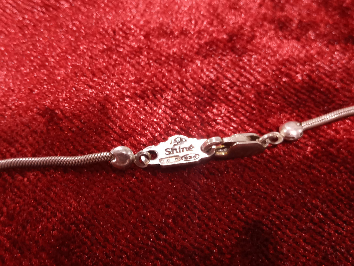 Collana in argento con ciondolo in madreperla