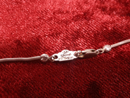 Collana in argento con ciondolo in madreperla