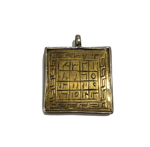 Pendente in argento e ottone con caratteri greci