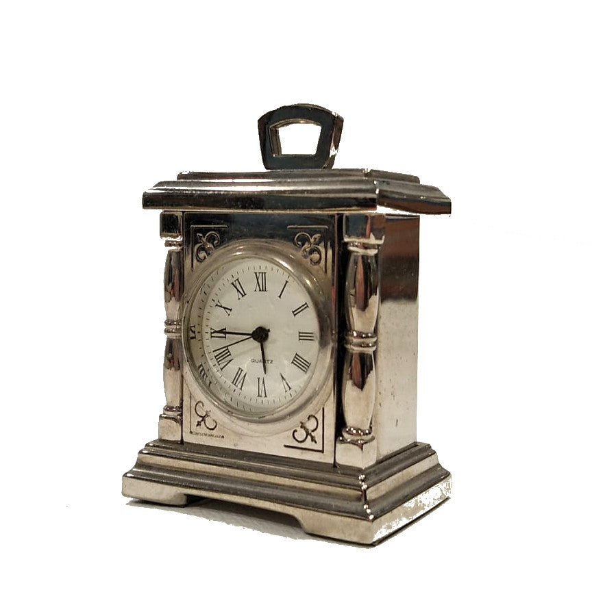 Orologino da viaggio in metallo rodiato