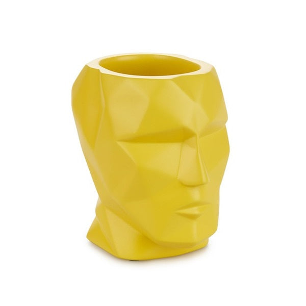 Portapenne in cemento "Testa sfaccettata" (disponibile in quattro colori)